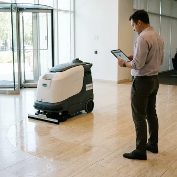 Autonomous cleaning robot in commercial lobby