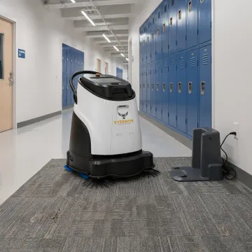 Commercial robotic vacuum in a modern facility