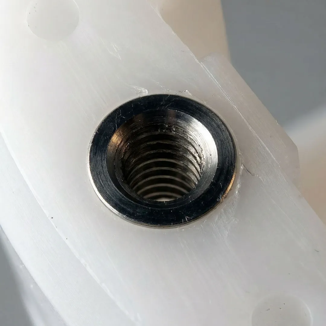 Close-up of precision micro injection molded components showing intricate detail