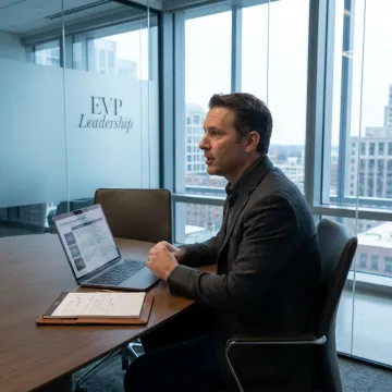 Tech executive receiving leadership coaching