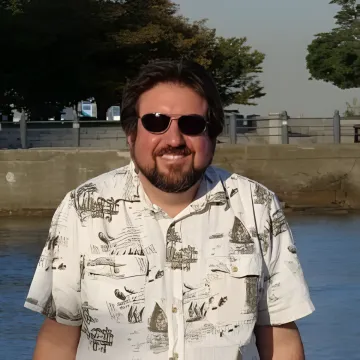 Professional headshot of Brian Duprey, Director of Technical Operations