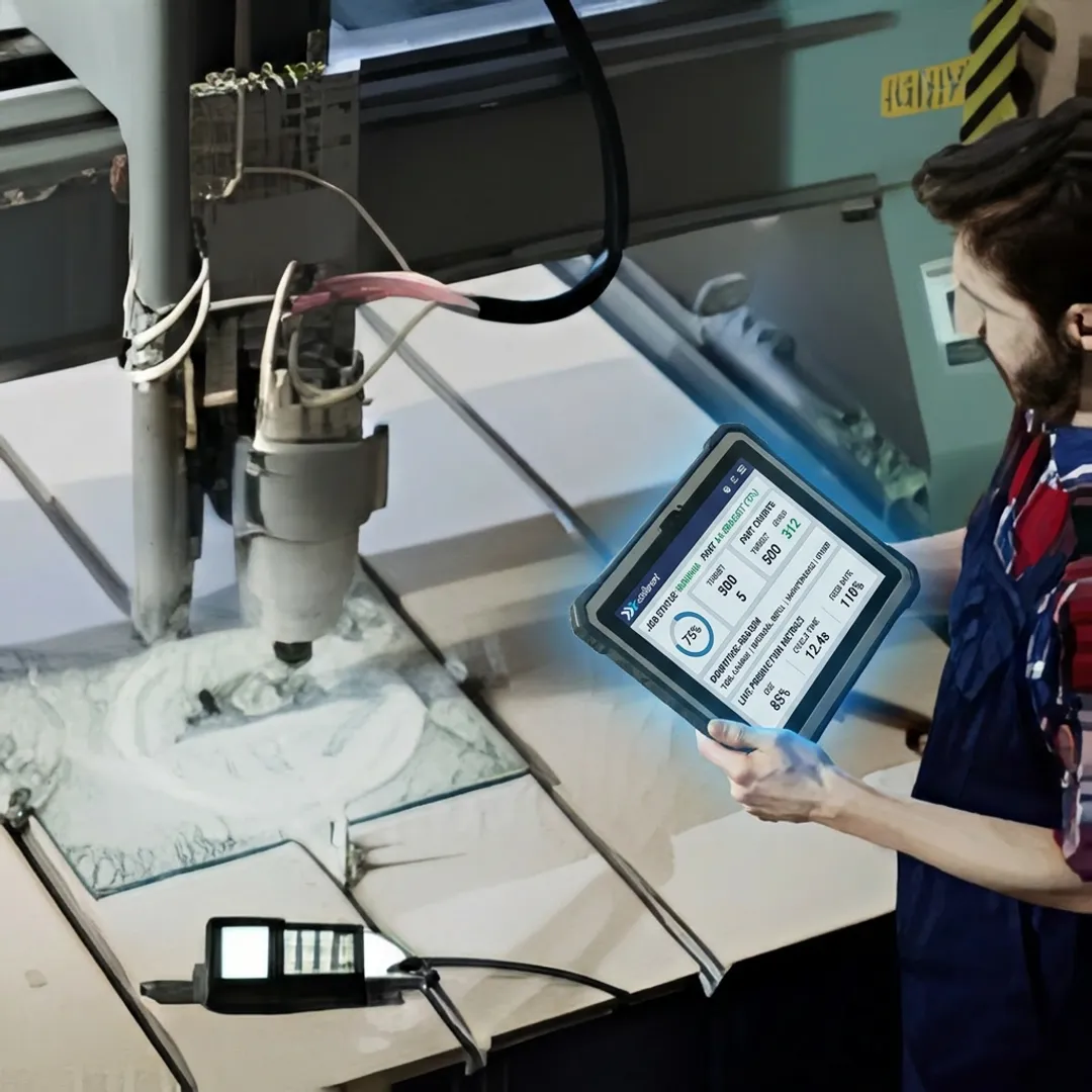 Operator using a tablet HMI on a manufacturing shop floor
