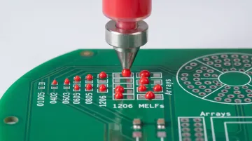 Red glue epoxy adhesive dispensing onto PCB pads before component placement