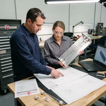Engineer reviewing infrared process control equipment