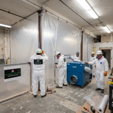 Interior demolition containment and cleanup process