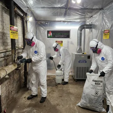 Certified asbestos pipe insulation removal crew
