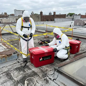 Asbestos roof removal safety process