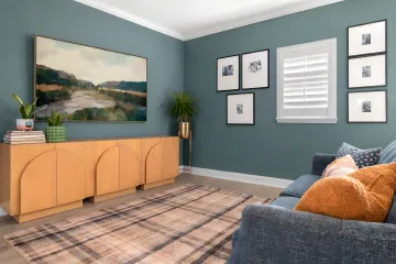 Beautifully styled home library with custom shelving and curated book collection