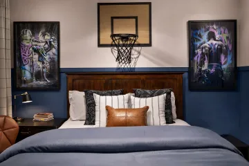 Professional interior designer consulting with Denver client in bright, modern living space