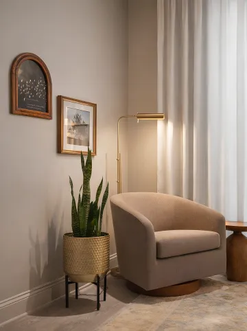 Designer reviewing material samples and furniture selections for commercial project