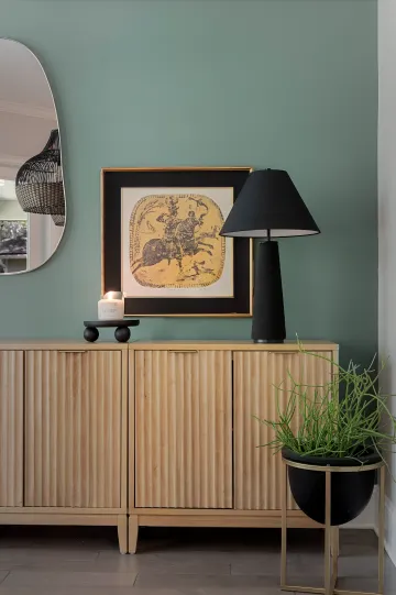 Modern professional office workspace with collaborative work areas and natural lighting