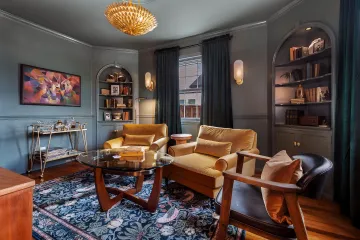 Elegant Roswell interior featuring custom furniture, natural textures, and sophisticated lighting design