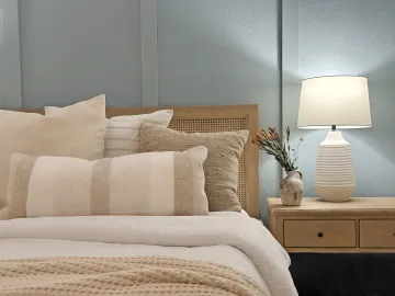 Elegant custom furnished living room with designer furniture and curated décor elements