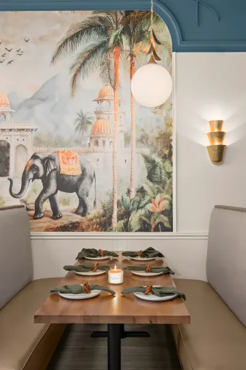 Designer selecting fabric swatches and material samples for interior project