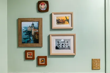 Modern home office with ergonomic desk setup, natural lighting, and organized shelving