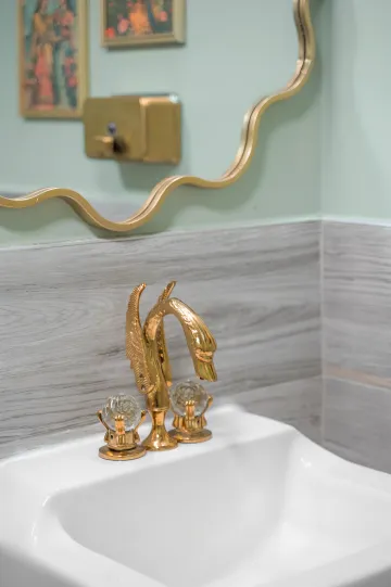 Interior designer working on custom space planning with fabric swatches and design materials