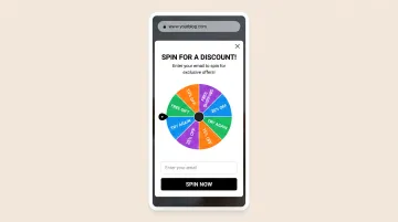 Interactive spin-to-win gamification popup wheel with multiple discount tiers and email capture