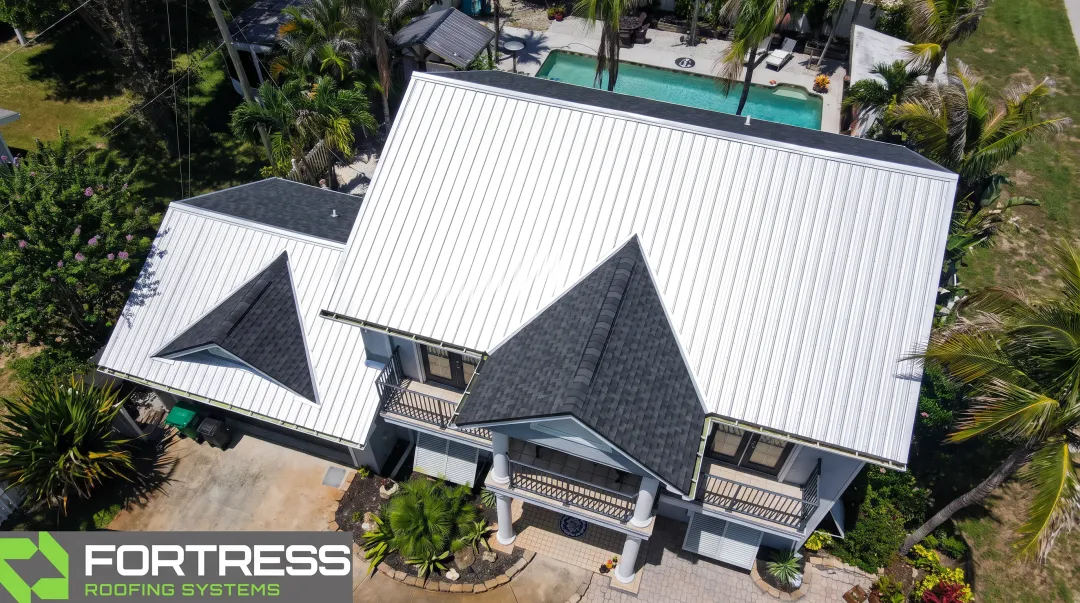 Fortress Roofing Systems hybrid roof installation with metal accents and shingles