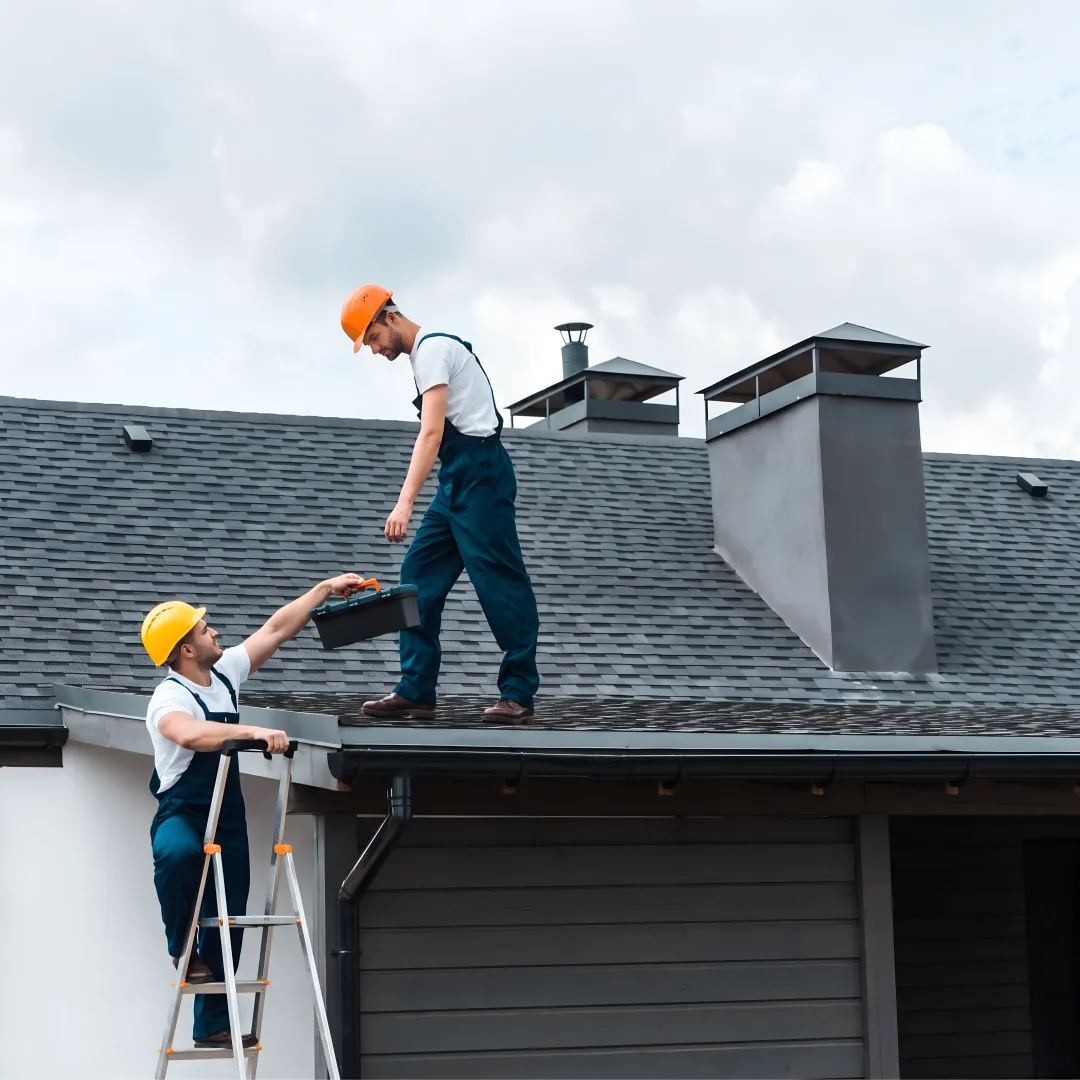 Roof inspector reviewing roof condition