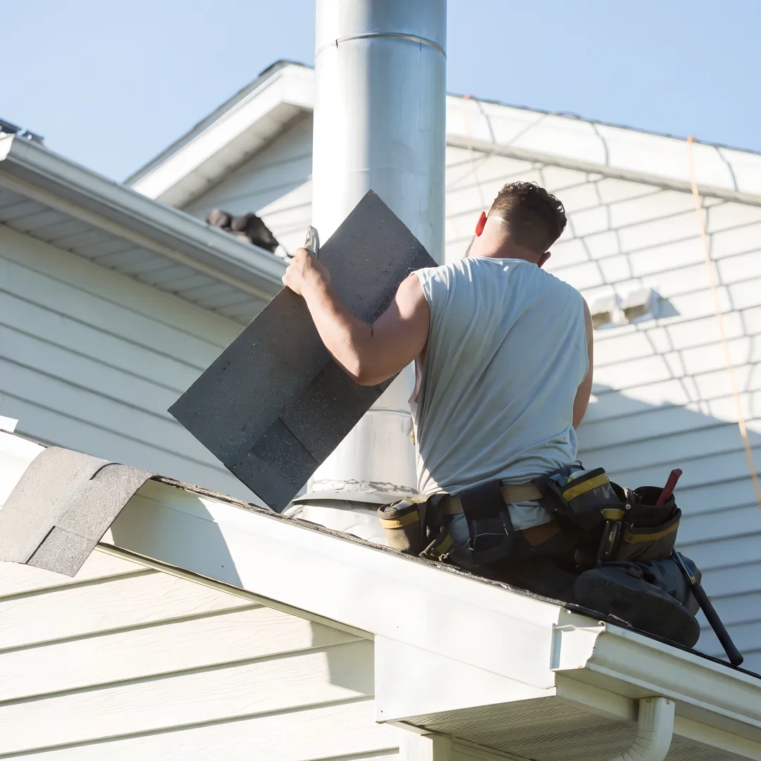 Roofing specialist inspecting a Florida home roof