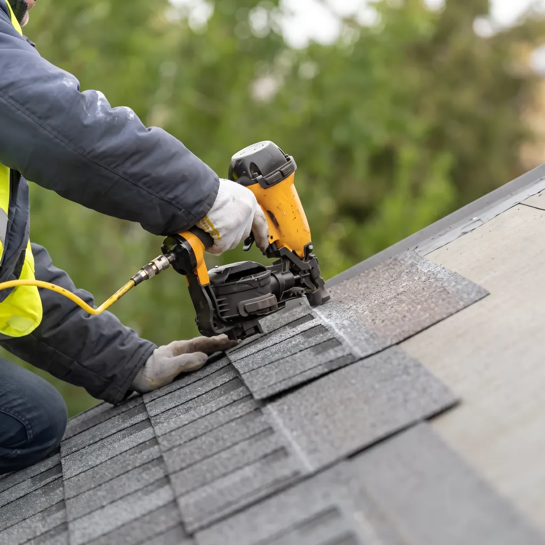 Roofing installer completing a final inspection