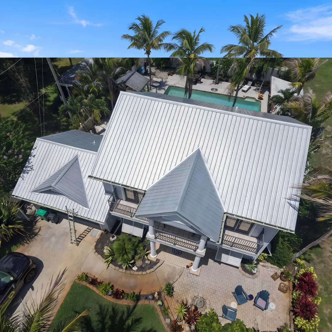 Roofing professional examining metal roof flashing