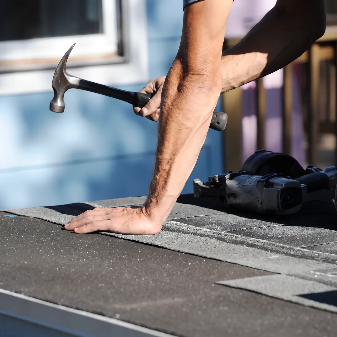 Inspector reviewing a roof’s condition