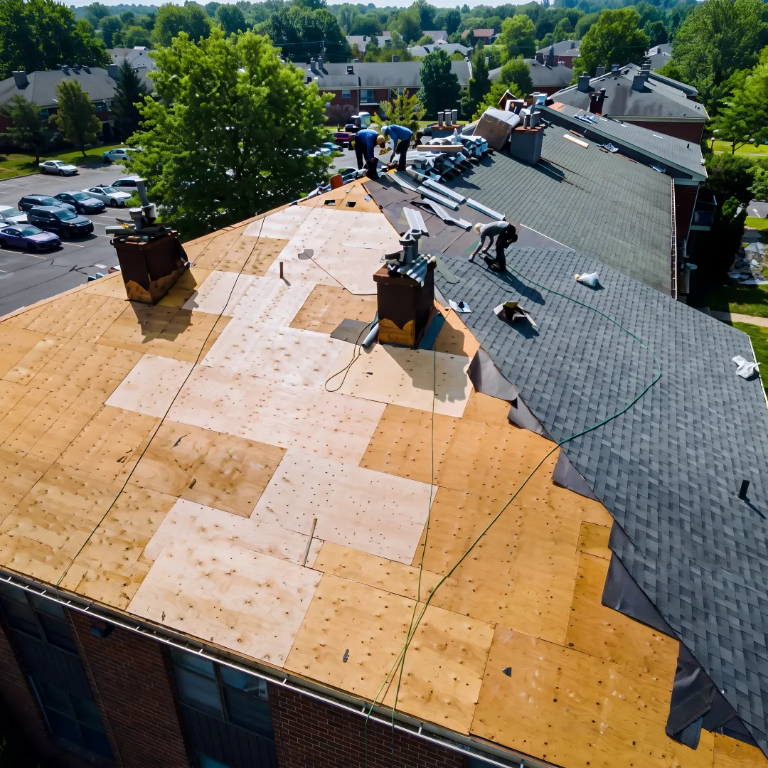 Roofer repairing a flat roof seam