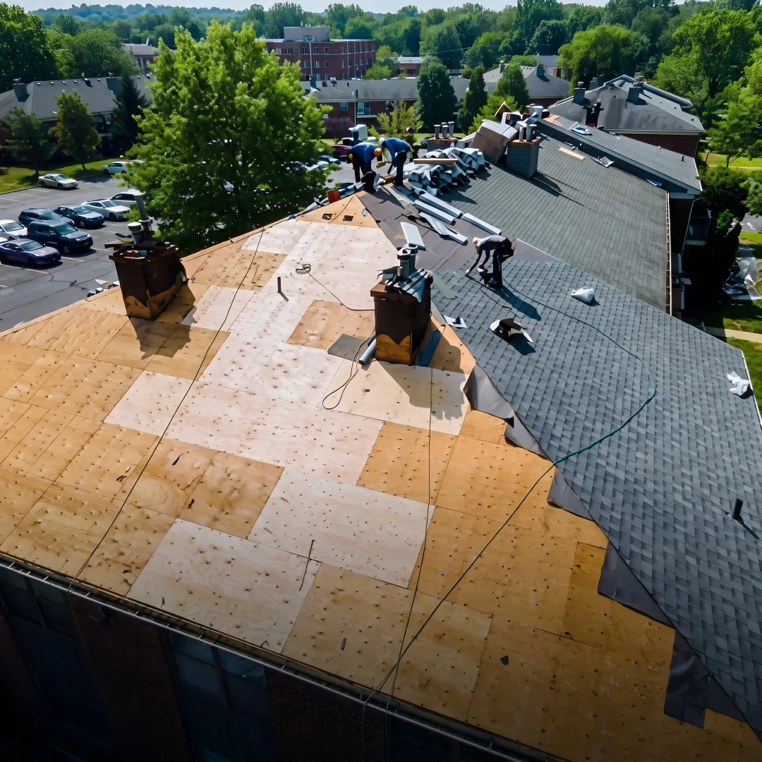 Roofing specialist inspecting shingles on a Florida home