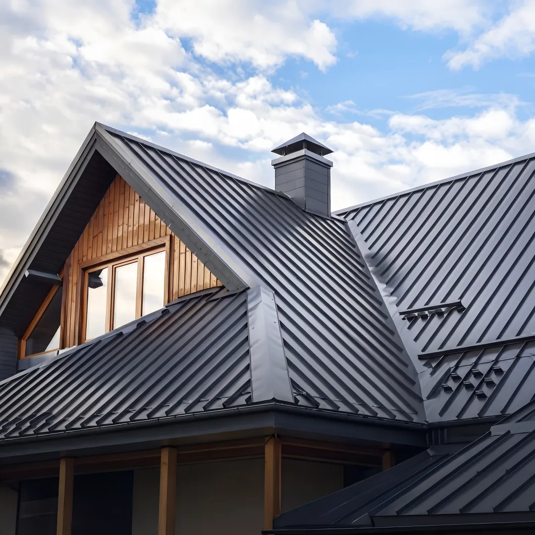Roofing professional inspecting metal roof panels