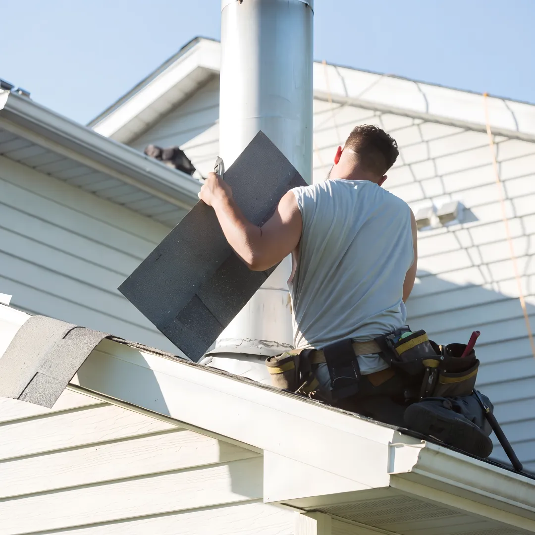 Technician inspecting a waterproof roofing system