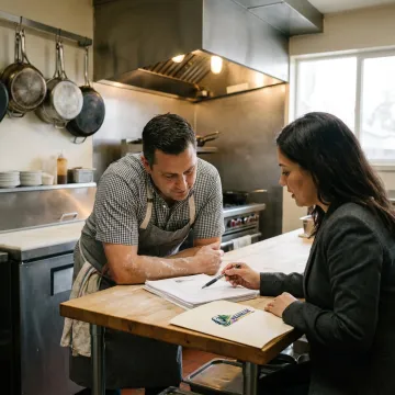 Restaurant owner reviewing financing options