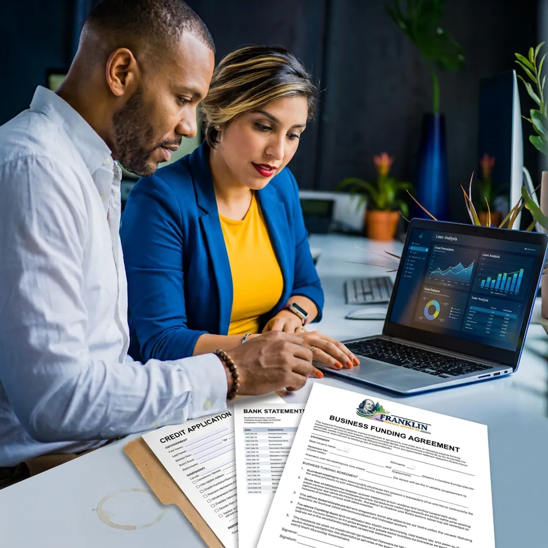Business owner and advisor reviewing financing documents