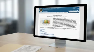 Regulatory compliance officer reviewing published examination priorities and risk alerts