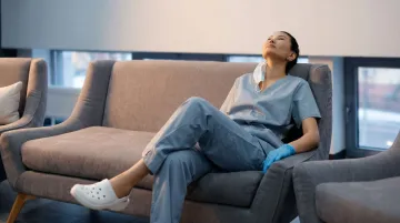 Healthcare worker sleeping restfully emphasizing sleep as burnout prevention strategy