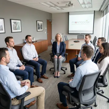 Facilitator leading a corporate mindfulness session