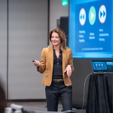 Mindfulness speaker presenting at a corporate event
