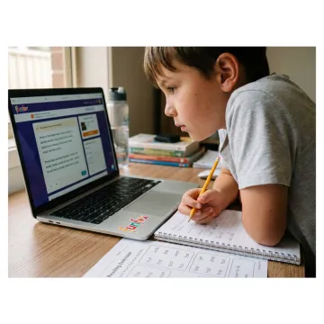 Student attending online English tutoring at home