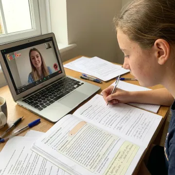 Year 8 student studying with online tutor