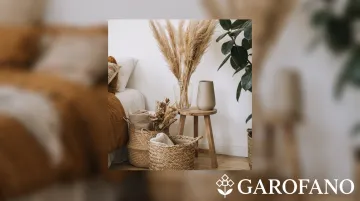 Organic bohemian nightstand with woven textures dried botanicals and raw ceramic vessels