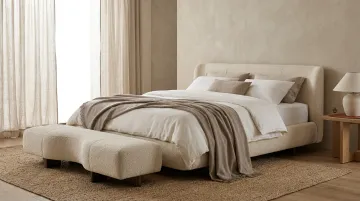 Cream upholstered Letto Lucca bed with boutique hotel style headboard