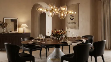 Italian-inspired dining room with solid wood table marble top and sculptural pendant lighting