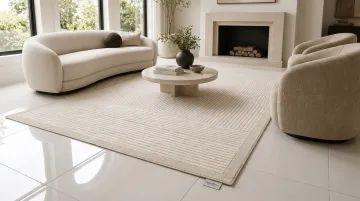 Garofano wool cotton silk blend area rugs styled in modern living room