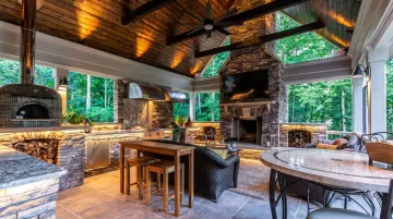 Stone gazebo outdoor kitchen and fireplace self-contained entertainment structure