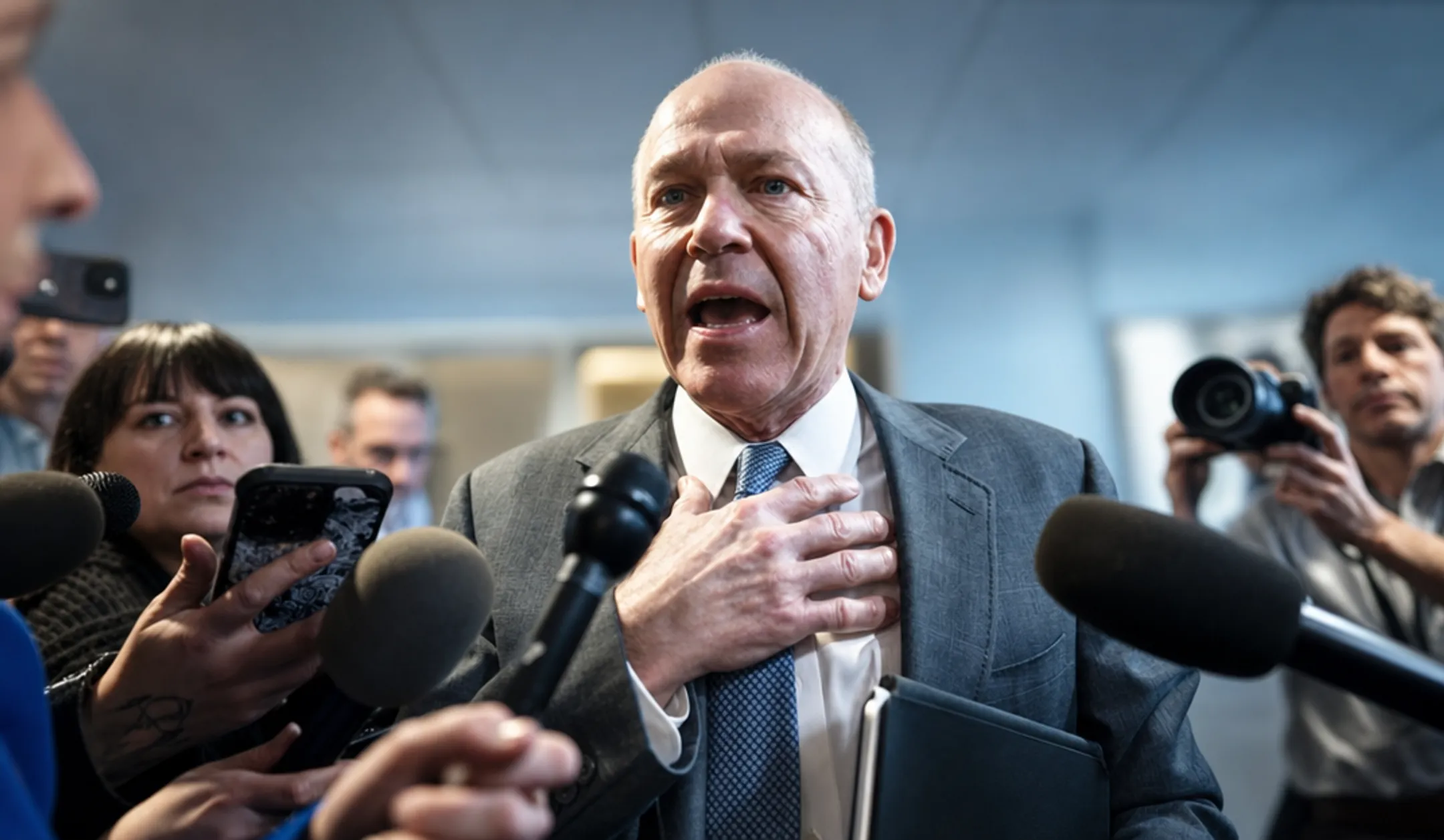 Confident business executive speaking to media during press interview