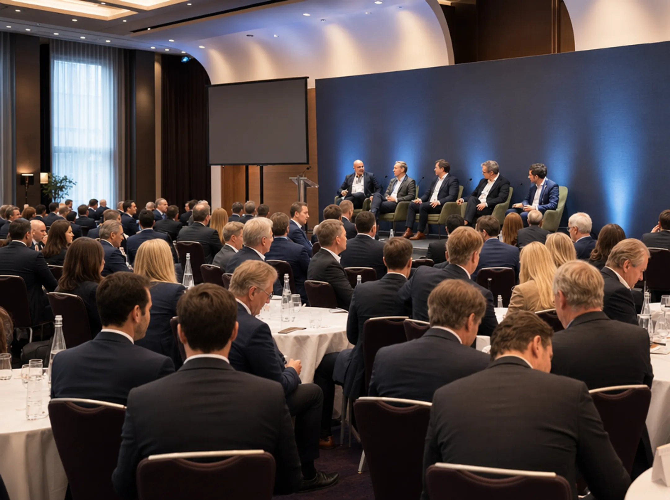 Institutional investor conference event with corporate presentations and networking