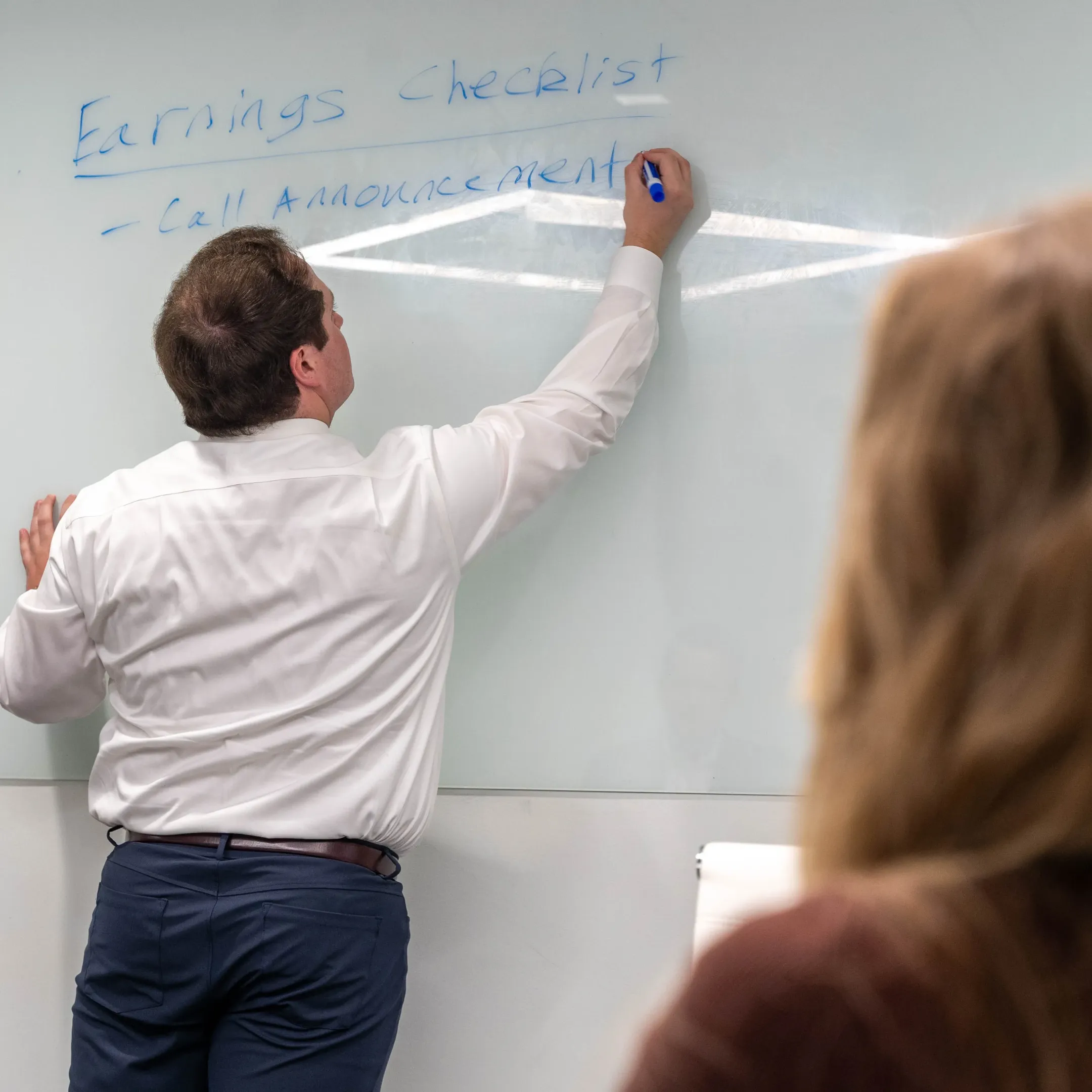 Advisors reviewing a corporate communications strategy