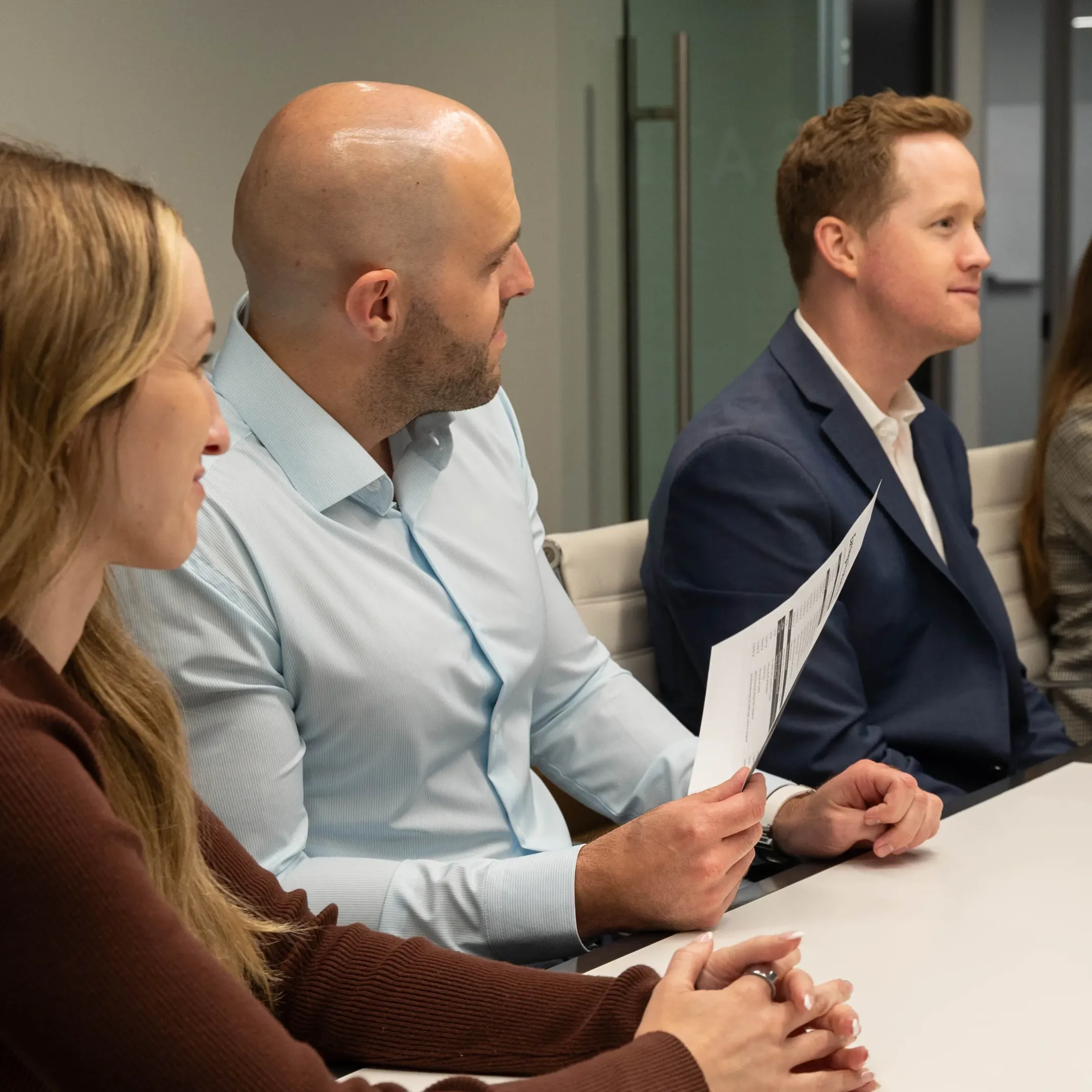 Executives reviewing IPO communications strategy