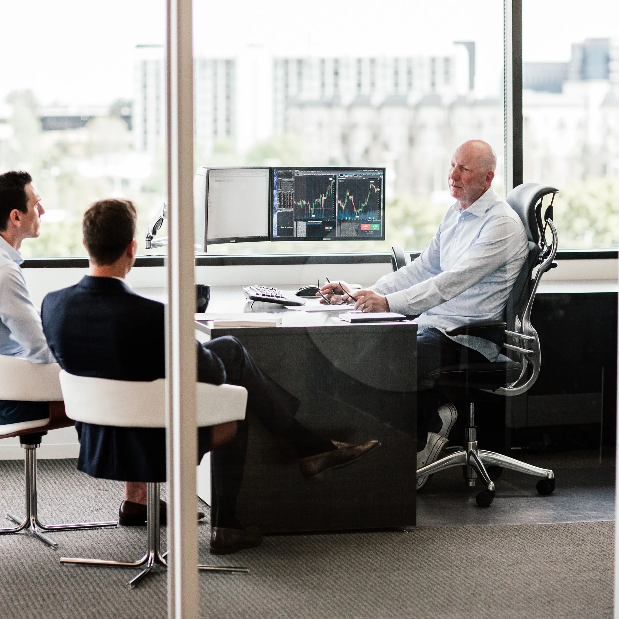 Communications advisors creating an investor presentation with company leadership
