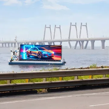 Digital outdoor advertising screen showing dynamic branded content